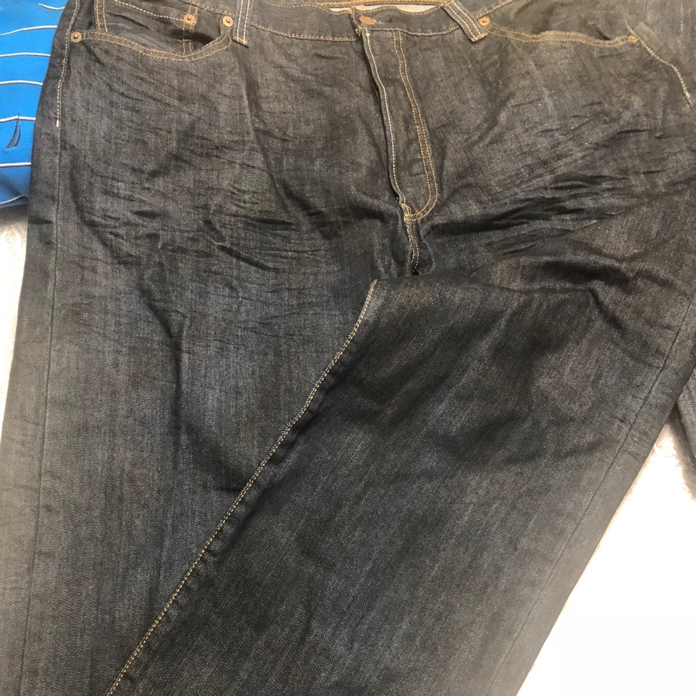 Levi's 501 vintage button fly dark blue jeans.